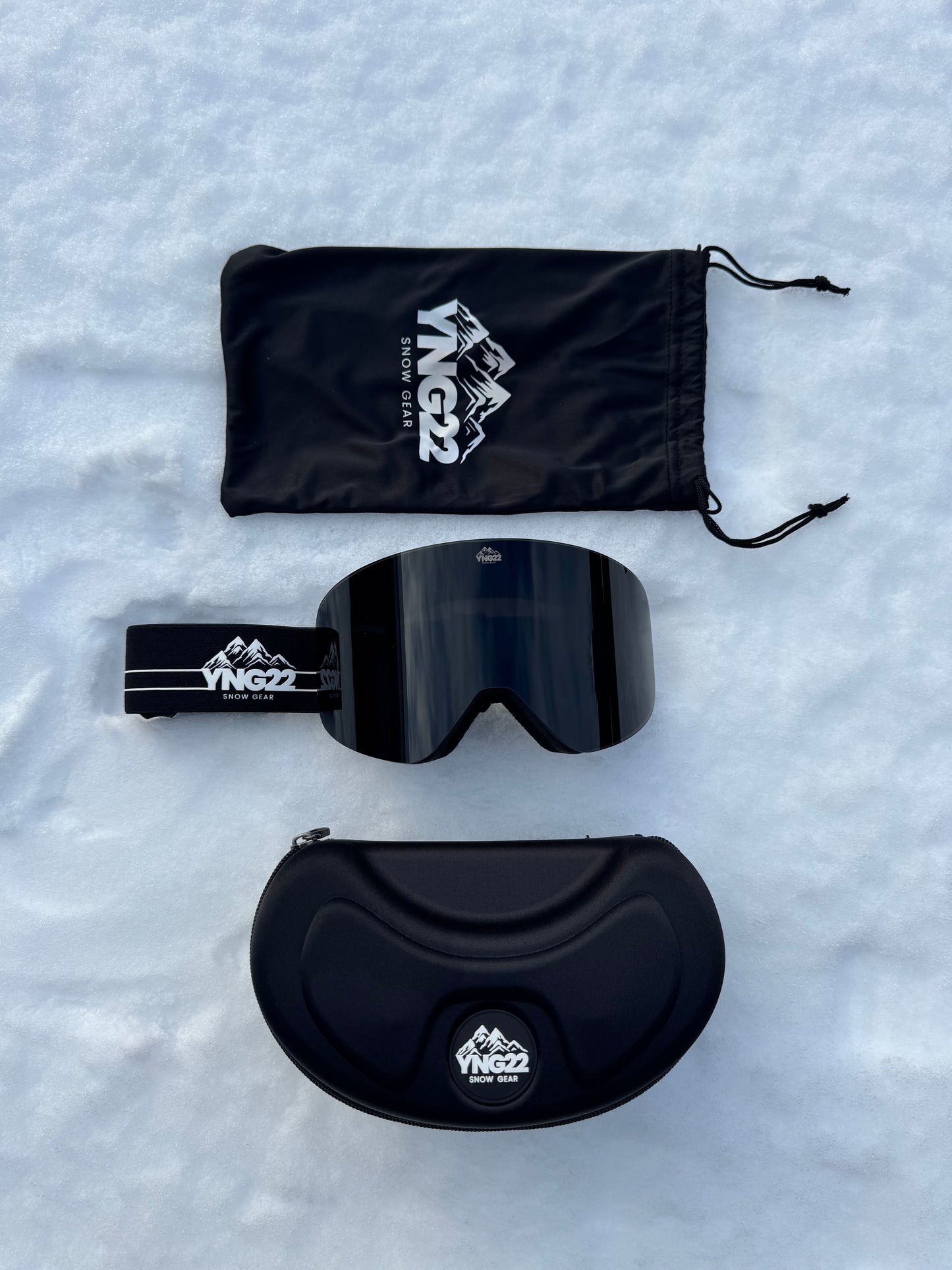 Skibril met verwisselbare lens Zwarte band met zwarte lens verpakt in de hardcase/beschermdoos